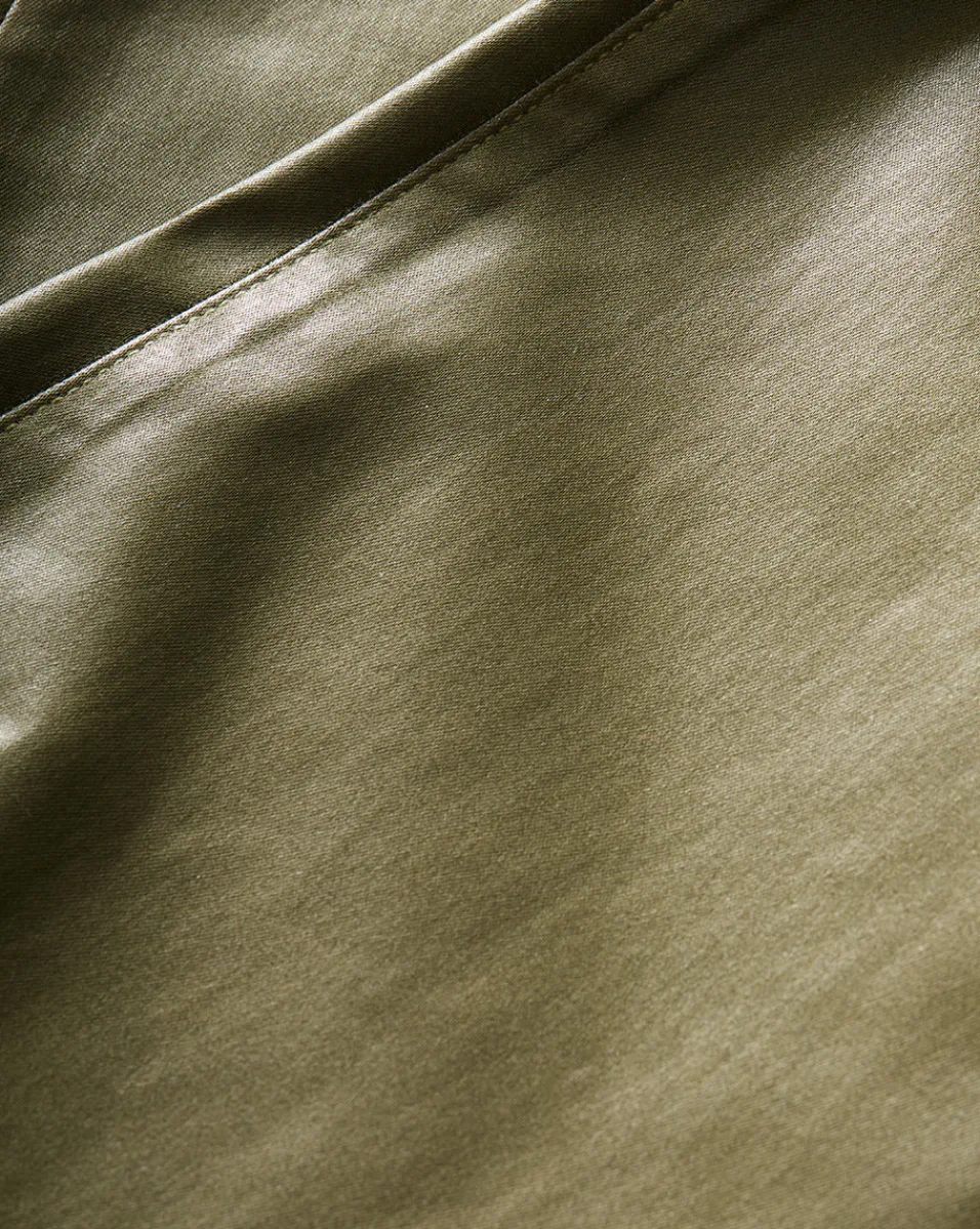 Carson Coated Off-Duty Kick-Flare Jean in Army High Gloss>Veronica Beard New